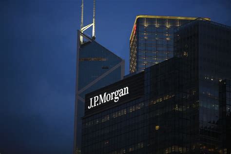 JPMorgan Chase, KBR rise; Global Payments, Exxon Mobil fall